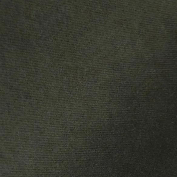 Pewter king-size upholstered bed in velvet fabric with wingback headboard and low-profile black metal legs.

