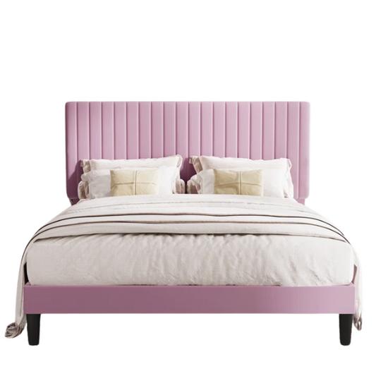 Pink velvet upholstered queen bed with tufted rectangular headboard and low-profile frame.

