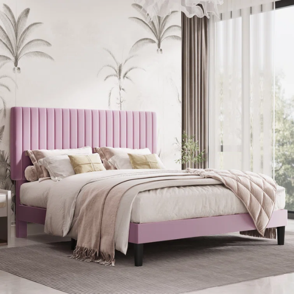 Pink velvet upholstered queen bed with tufted rectangular headboard and low-profile frame.

