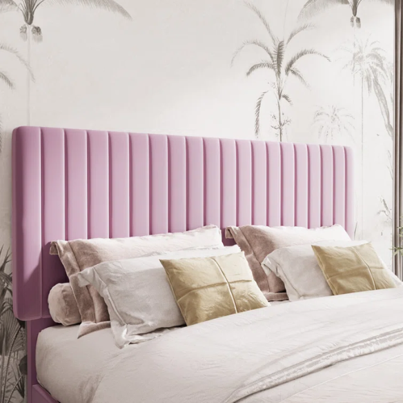 Pink velvet upholstered queen bed with tufted rectangular headboard and low-profile frame.

