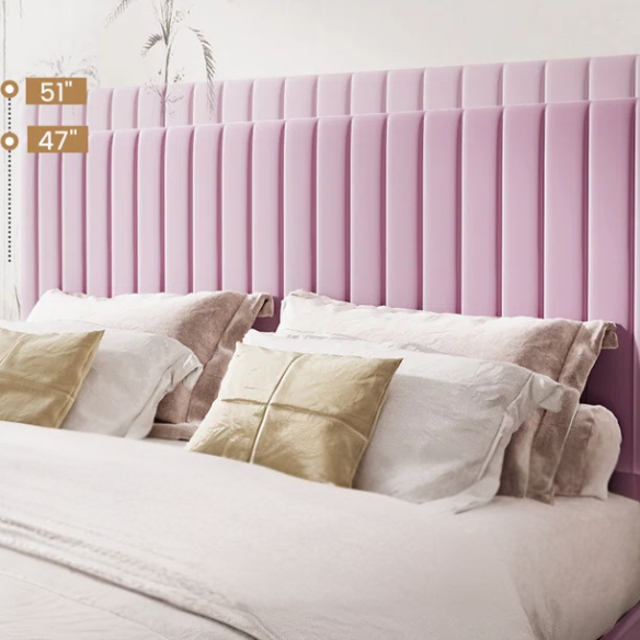 Pink velvet upholstered queen bed with tufted rectangular headboard and low-profile frame.

