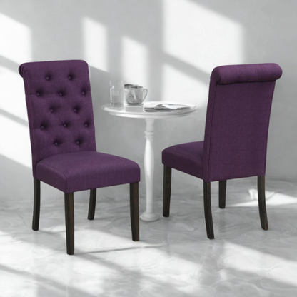Set of 2 purple tufted high-back dining chairs with espresso-finished solid wood legs and soft polyester upholstery—ideal for adding color and elegance to dining spaces.

