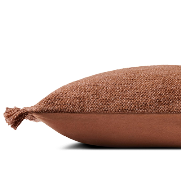 Rust-colored rectangular lumbar throw pillow with fringe trim, 13x21 inches, featuring a cotton-polyester-rayon cover and plush polyester fill—ideal for modern or boho home décor.

