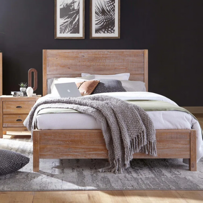Rustic tan queen size solid wood bed frame with distressed plank headboard and sturdy pine construction