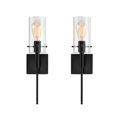 Set of 2 black wall sconces with hand-blown glass cylinder shades and bronze hardware, mountable up or down for modern or farmhouse interiors

