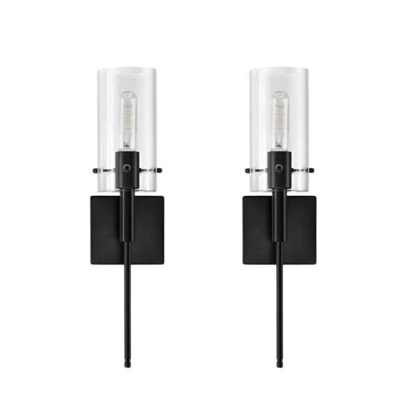 Set of 2 black wall sconces with hand-blown glass cylinder shades and bronze hardware, mountable up or down for modern or farmhouse interiors

