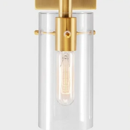 Set of 2 gold wall sconces with clear hand-blown glass cylinder shades and bronze thumbscrews, mountable up or down for modern and farmhouse interiors

