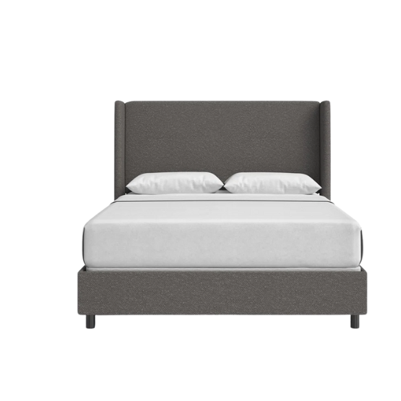 Smoky grey king-size upholstered bed in bouclé fabric with wingback headboard and low-profile black metal legs.

