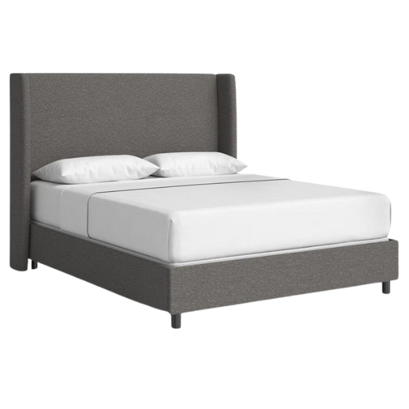 Smoky grey king-size upholstered bed in bouclé fabric with wingback headboard and low-profile black metal legs.

