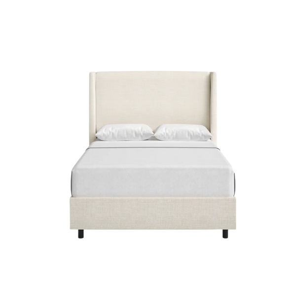 Talc king-size upholstered bed in linen fabric with wingback headboard and low-profile black metal legs.

