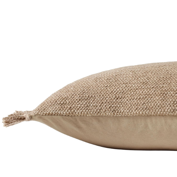 Tan rectangular lumbar throw pillow with fringe, 13x21 inches, made from a cotton-polyester-rayon blend and filled with plush polyester—perfect for neutral, modern, or boho interiors.


