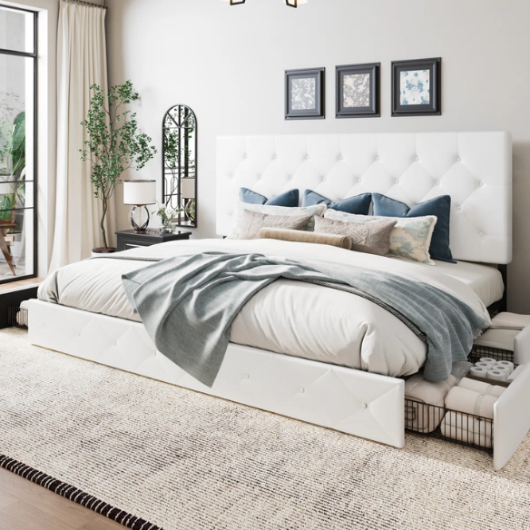White faux leather queen bed with diamond-tufted adjustable headboard and four underbed storage drawers.

