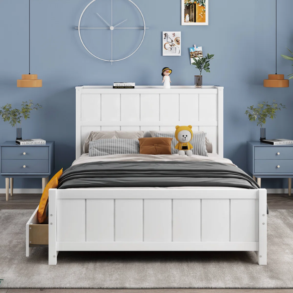White full size platform bed with four underbed storage drawers, integrated headboard shelving, and solid wood slat support