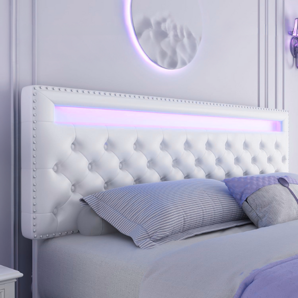Full size platform bed upholstered in white velvet with button-tufted adjustable LED headboard, silver nailhead trim, and four underbed storage drawers on casters