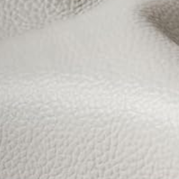 Full size platform bed upholstered in white velvet with button-tufted adjustable LED headboard, silver nailhead trim, and four underbed storage drawers on casters