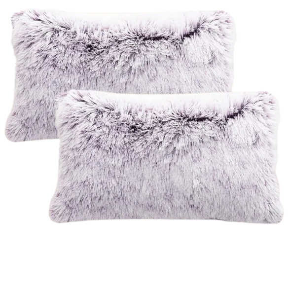 Set of two purple and white ombré faux fur throw pillows with plush texture on a modern neutral-toned couch

