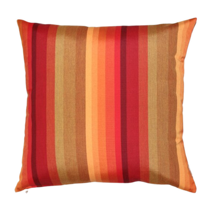 Striped accent pillow in red, orange, and brown – reversible, weather-resistant, and overstuffed for cozy indoor or outdoor décor.

