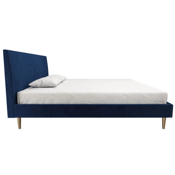 Royal blue velvet king platform bed with tufted rectangular headboard, wood slat support, and sleek low-profile design.

