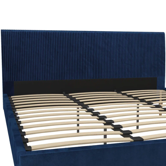 Royal blue velvet king platform bed with tufted rectangular headboard, wood slat support, and sleek low-profile design.

