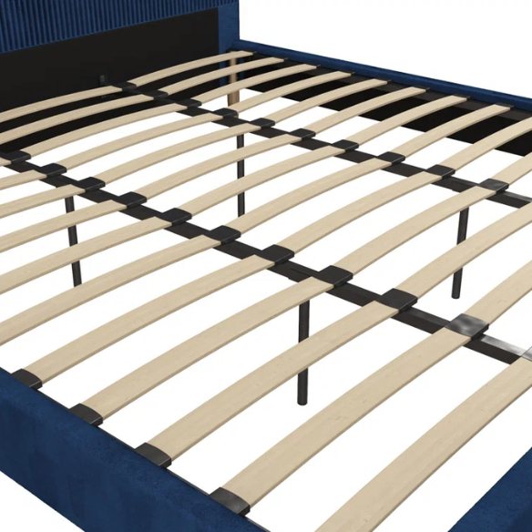 Royal blue velvet king platform bed with tufted rectangular headboard, wood slat support, and sleek low-profile design.

