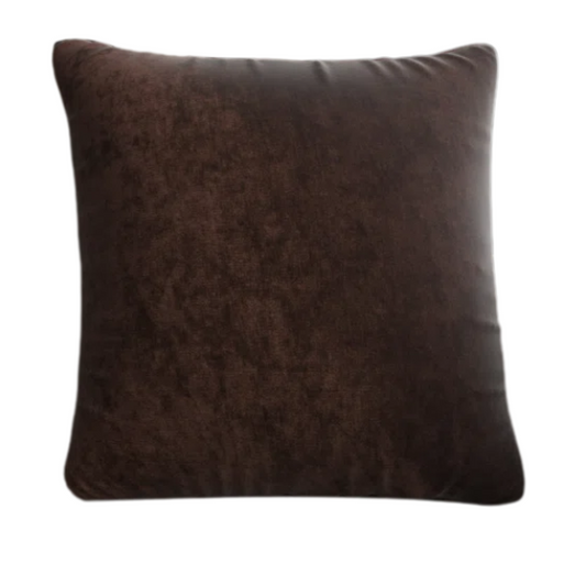 Rust crushed velvet throw pillow, 16x16 square design with soft texture and reversible fabric, styled on a modern sofa for cozy and elegant home decor.


