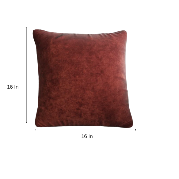 Rust crushed velvet throw pillow, 16x16 square design with soft texture and reversible fabric, styled on a modern sofa for cozy and elegant home decor.

