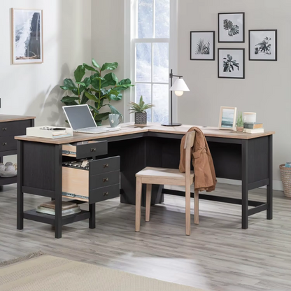 Rustic black L-shaped executive desk with split oak tabletop and storage drawers for home office or study.