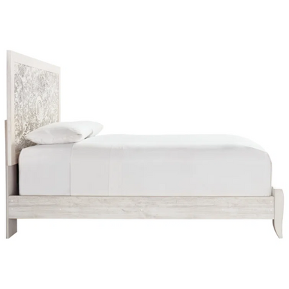 Rustic white king panel bed with intricately carved medallion headboard, decorative laminate finish, and adjustable height frame

