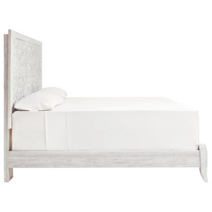 Rustic white king panel bed with intricately carved medallion headboard, decorative laminate finish, and adjustable height frame

