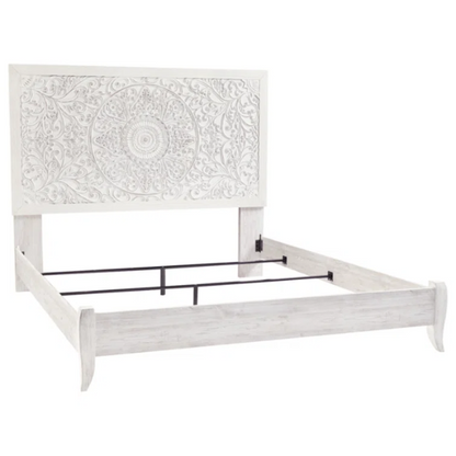 Rustic white king panel bed with intricately carved medallion headboard, decorative laminate finish, and adjustable height frame

