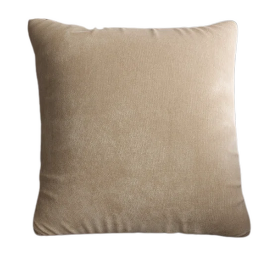 Sand crushed velvet throw pillow, 16x16 square with soft reversible fabric and hidden zipper, styled in a cozy, neutral-toned living space.

