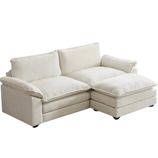 Soft warm cream chenille modular cloud sofa with pillow top arms, deep foam cushions, and matching ottoman