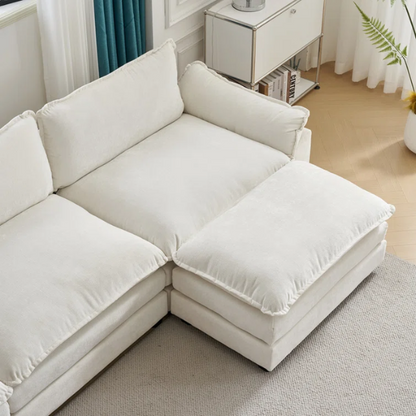 Soft warm cream chenille modular cloud sofa with pillow top arms, deep foam cushions, and matching ottoman