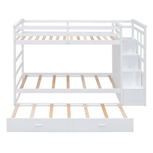 Solid white twin over twin bunk bed with staircase, storage drawers, and pull-out trundle in a modern children's bedroom
