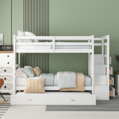 Solid white twin over twin bunk bed with staircase, storage drawers, and pull-out trundle in a modern children's bedroom
