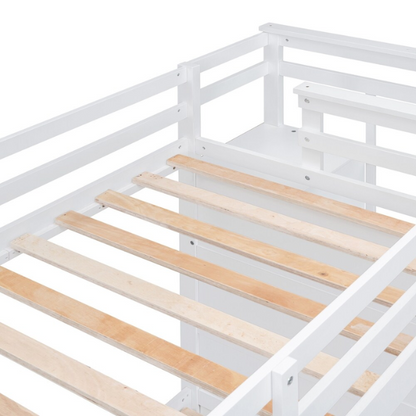 Solid white twin over twin bunk bed with staircase, storage drawers, and pull-out trundle in a modern children's bedroom
