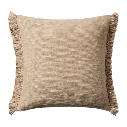 Tan cotton blend throw pillow with fringe, 22x22 square cushion featuring soft texture and hidden zipper, styled on a neutral sofa for cozy, earthy decor.

