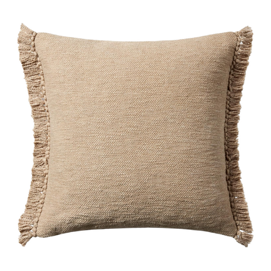 Tan cotton blend throw pillow with fringe, 22x22 square cushion featuring soft texture and hidden zipper, styled on a neutral sofa for cozy, earthy decor.

