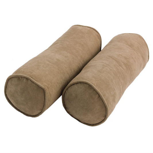 Set of 2 tan bolster throw pillows with soft microsuede covers, corded edges, and plush polyester fill, perfect for adding warmth and comfort to any indoor space.

