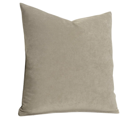 Taupe crushed velvet throw pillow, 16x16 square design with soft texture and reversible fabric, styled on a modern sofa for cozy, neutral home decor.

