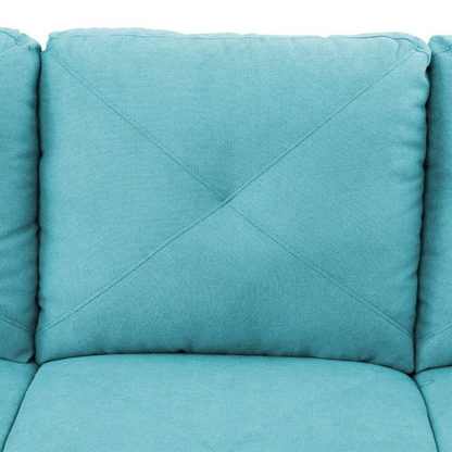 Teal L-shaped sectional sofa with right-facing chaise and ottoman, microfiber upholstery and light gray wooden legs