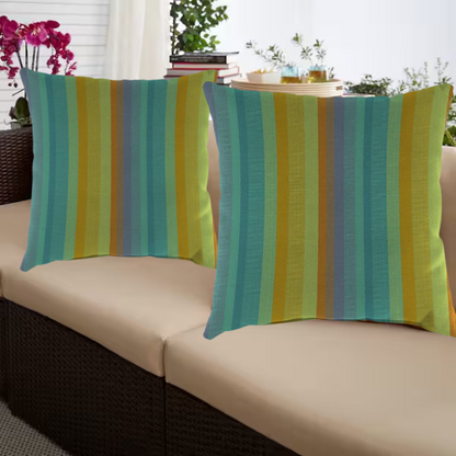 Striped accent pillow in teal, lime green, blue, and orange – reversible, weather-resistant, and overstuffed for indoor and outdoor comfort on patios, porches, or couches.

