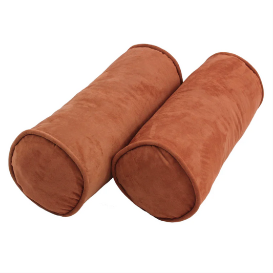 Set of 2 terracotta bolster throw pillows with soft microsuede covers, corded edges, and plush polyester fill, perfect for adding warmth and comfort to any indoor space.

