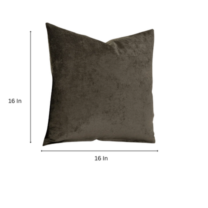 Umber crushed velvet throw pillow, 16x16 square with soft, reversible fabric and hidden zipper, styled on a cozy sofa for a warm, elegant touch.

