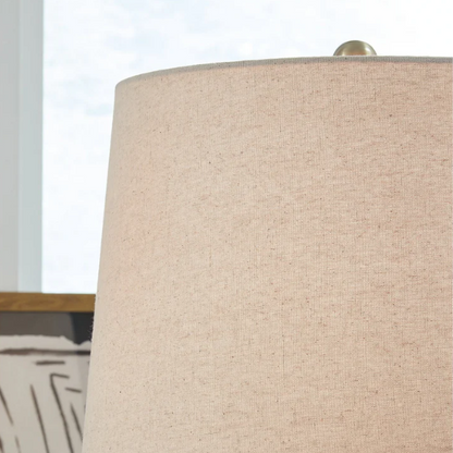 Set of two white ceramic table lamps with textured conical bases and modified drum fabric shades, 3-way switch, 26.5 inches tall.

