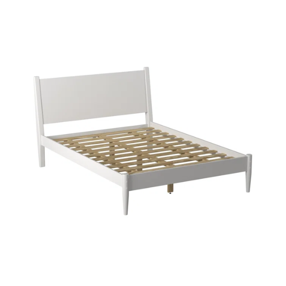 White full-size mid-century modern solid wood platform bed with tapered legs and rectangular headboard