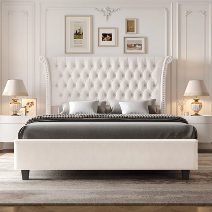 White velvet king-size platform bed with tall tufted wingback headboard, nailhead trim, and no box spring required

