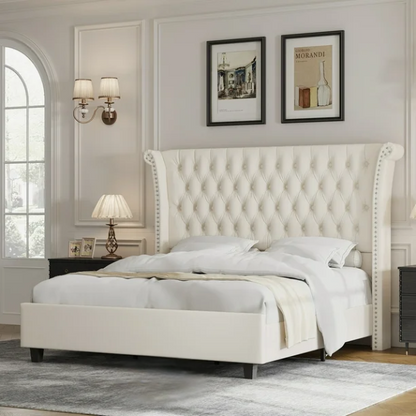 White velvet king-size platform bed with tall tufted wingback headboard, nailhead trim, and no box spring required

