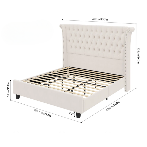 White velvet king-size platform bed with tall tufted wingback headboard, nailhead trim, and no box spring required

