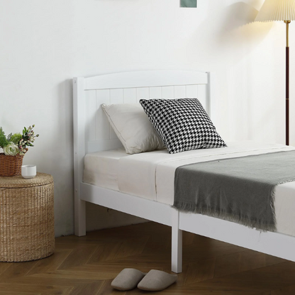White twin platform bed frame with headboard, made of solid pine wood, featuring underbed storage and slatted base – minimalist design for kids, teens, or adults.

